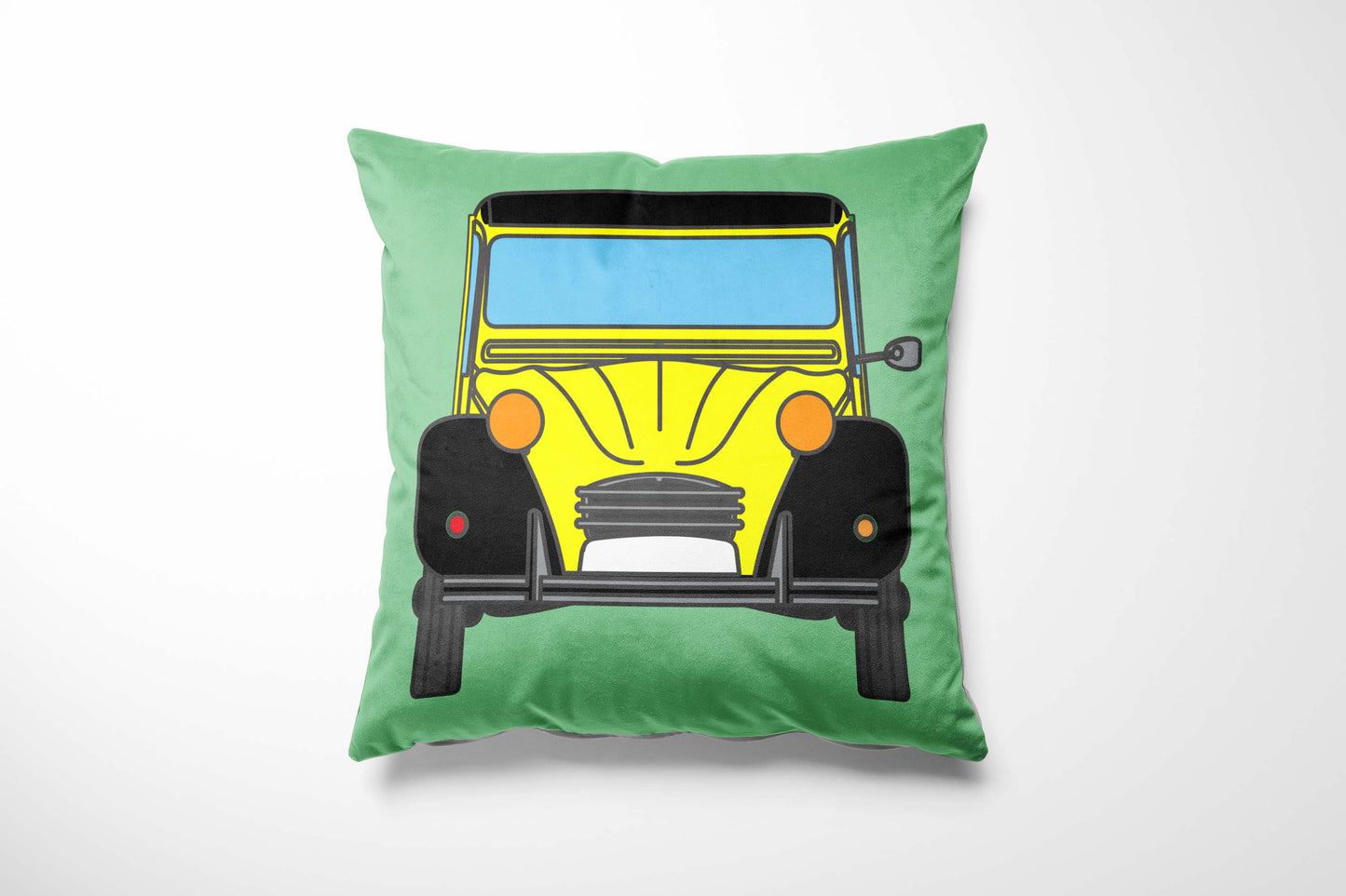 Green cushion with a yellow & black Charleston design.