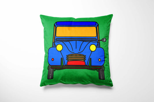 Cushion with a colourful car design on a green background