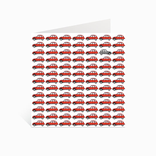 Small Red 2CVs with one Grey