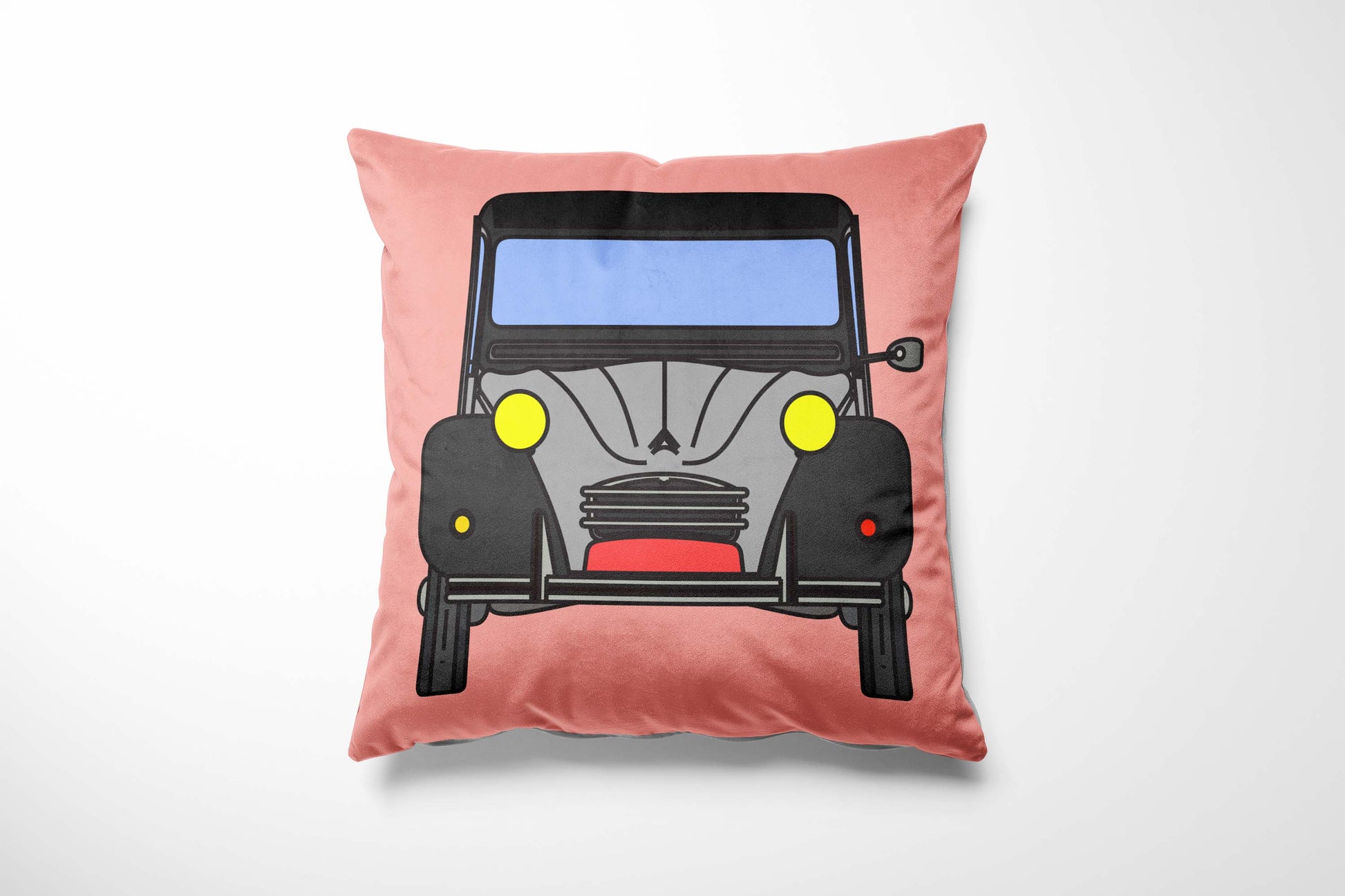 Pink cushion with a grey & grey Charleston design.