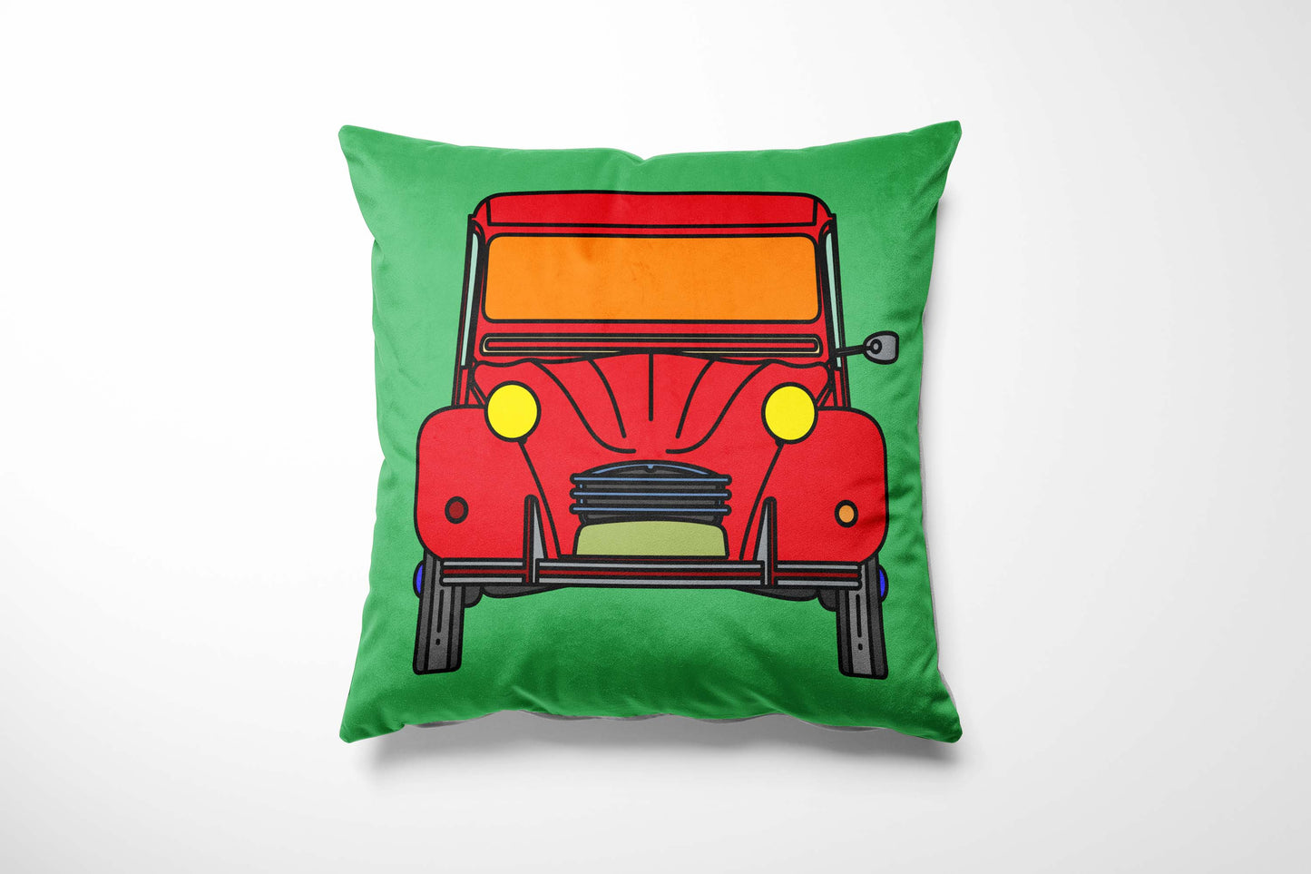 Green cushion with a red car design