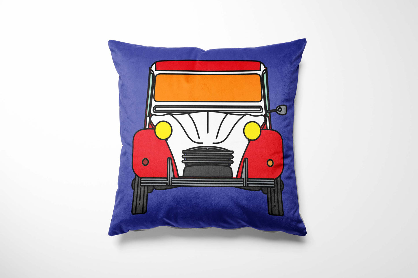 Cushion with a red & white car design on a blue background